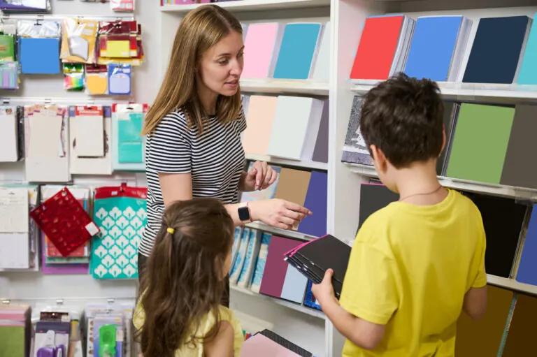 back to school lady showing books